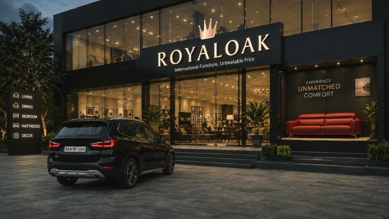 Royal Oak flagship furniture showroom exterior with brand signage and a red sofa display