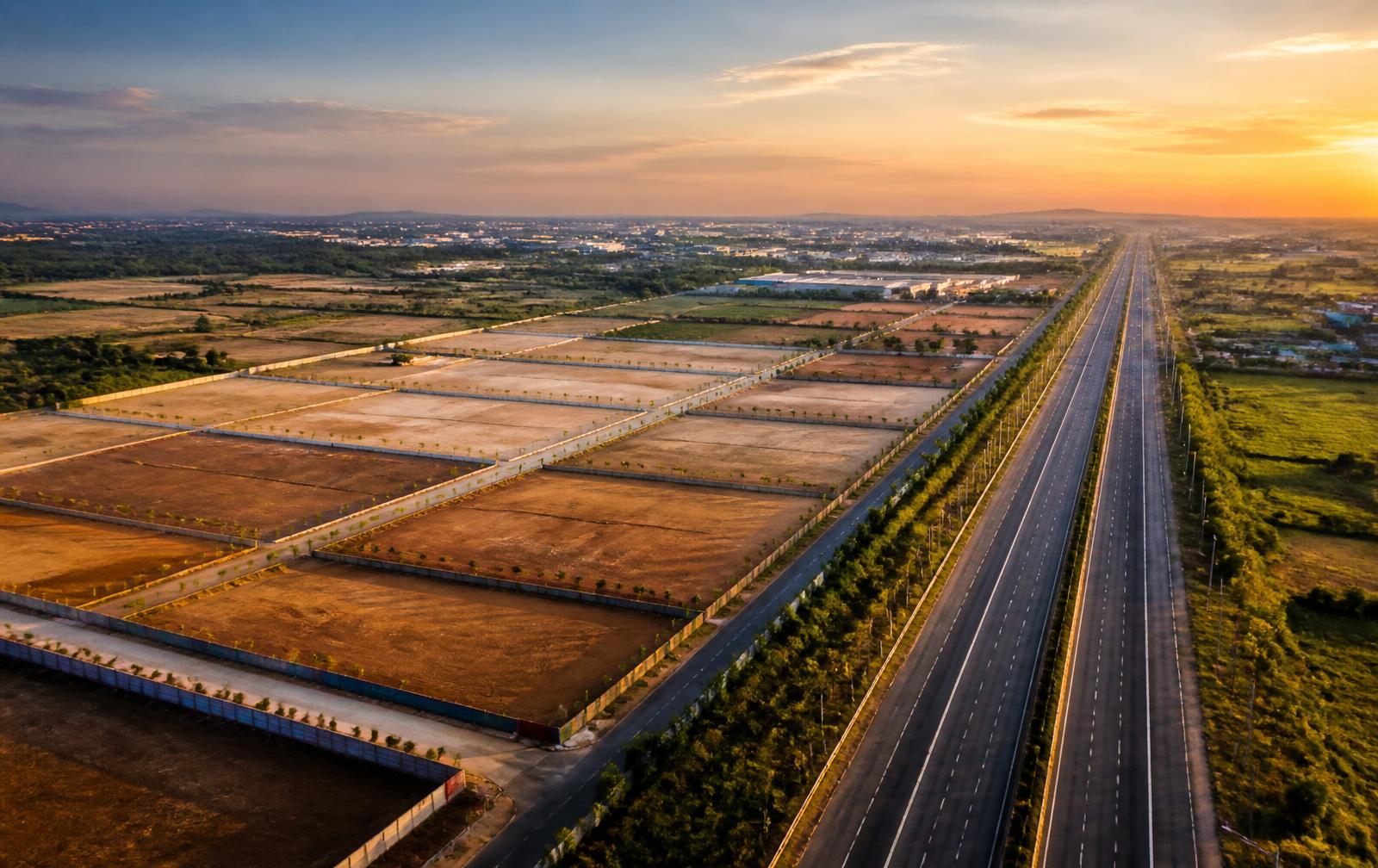 Investment-ready industrial land parcels beside a modern highway